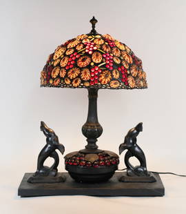 Art Deco Lamp With Richard Hoosin Shell Shade: Richard Hoosin (American, 1944-). Leaded shade with shells, stained glass and glass beads, signed Hoosin and dated 95 on the cap. On a later art deco style lamp, patinated metal with shells and glass