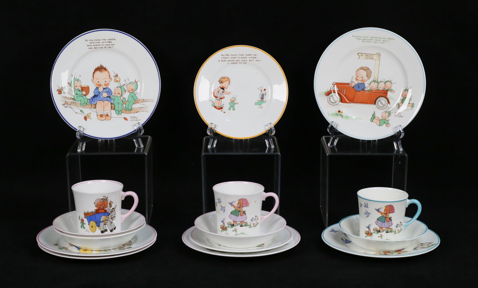 15 Pieces Mabel Atwell Shelley Boo Boo Porcelain: 15 pieces Shelley porcelain, decorated based on The Boo-Boos by Mabel Lucie Attwell. 3 cups, 5 dessert plates, 2 bread and butter plates, 4 berry bowls. All with green Shelley marks to the undersides.