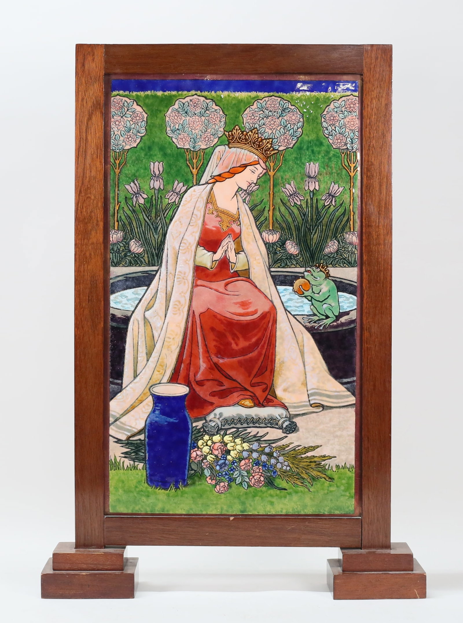 Enamel on Copper Plaque The Frog Prince: Enamel decorated copper plaque, scene from the Grimm's FairyTales The Frog Prince. Unsigned. In a mission style wood frame. Plaque 21 1/2" x 12 1/2", with stand 26 3/4"H x 18 1/2"W. Crazing to enamel 