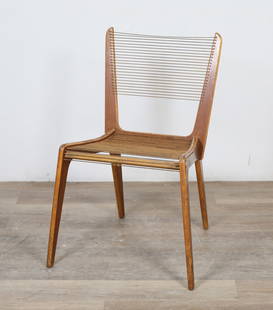 Jacques Guillon Mid Century Modern Cord Chair: Jacques Guillon (French-Canadian, 1922-2020). 20th century. Mid Century Modern chair in angular form executed in laminated walnut and nylon. Originally designed in 1952. "Made in Canada" printed on un