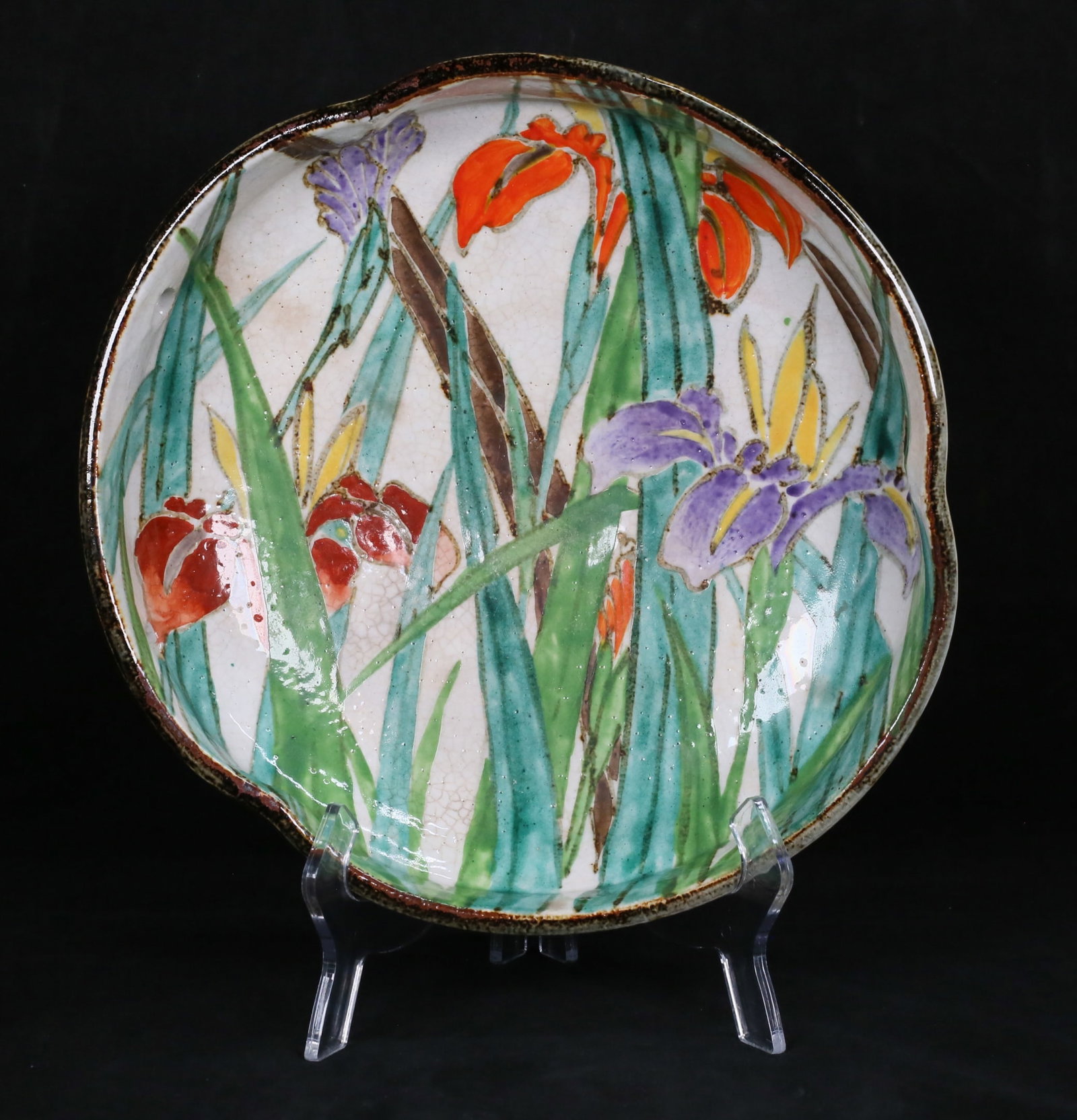 Japanese Pottery Bowl: Japanese pottery bowl. Hand painted floral decoration. 3 3/4"H x 12"-diameter. Chip to the rim on one side.