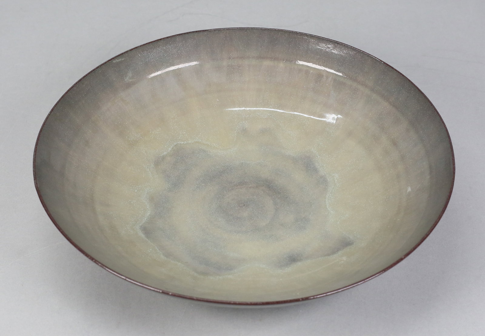 Gertrud & Otto Natzler Art Pottery Bowl: Gertrud Natzler (Austrian, 1908-1971) and Otto Natzler (Austrian, 1908-2007). Eggshell pottery low bowl. Signed on the underside Natzler. 2 1/2"H x 11"-diameter.