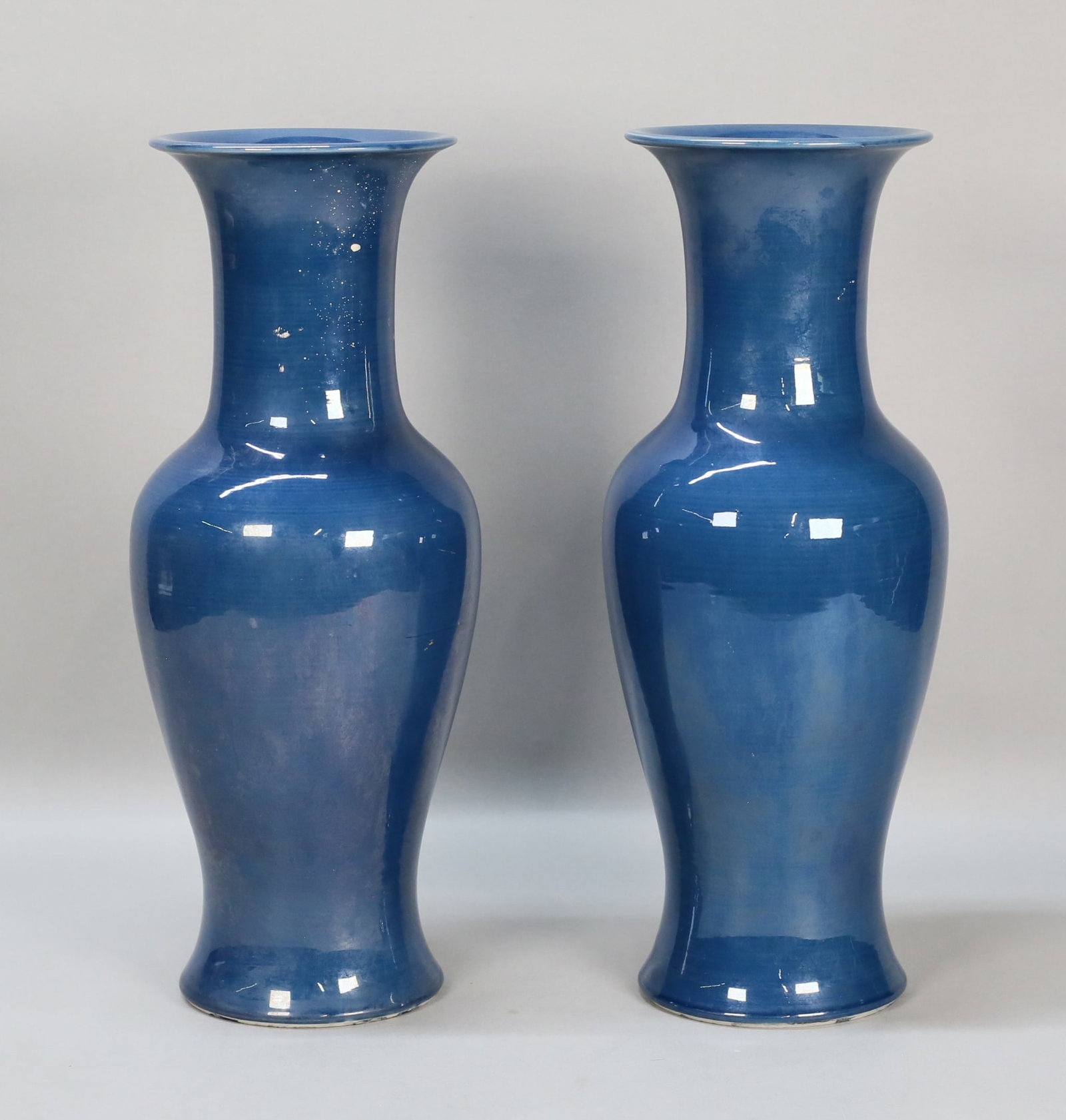 Pair of Japanese Porcelain Vases: Pair of Japanese porcelain vases. Both with Made in Japan paper labels. Each 16"H. Both drilled, one with paint drips throughout. Provenance: Estate of Princess Maria "Mimi" Romanoff.