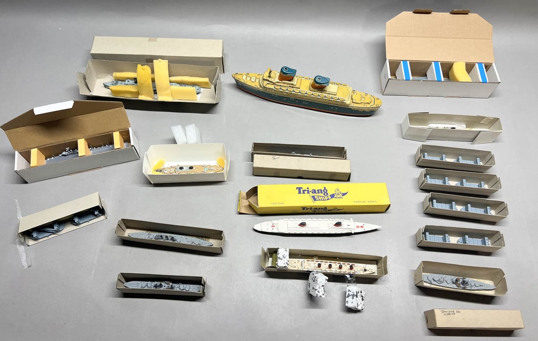 17 Metal Ship Models: 17 Metal Ship Models including Spidernavy.com USS Antietam 1953, Tri-ang Ships Waterline Models, iron duke. Not all ships have been identified. Provenance: This entire collection is from the Estate of