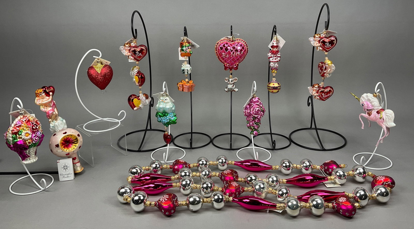 12 Radko Fraga Breen V-Day Ornaments Garland: 12 Radko Fraga Breen V-Day Ornaments and Garland Most w/ Tags. Includes Breen Red Valentines Heart - 4.5" - shortest. Fraga Marshmallow Dream. Radko Wrapped Up in Love #0201880 -7", Chain of Hearts Ga