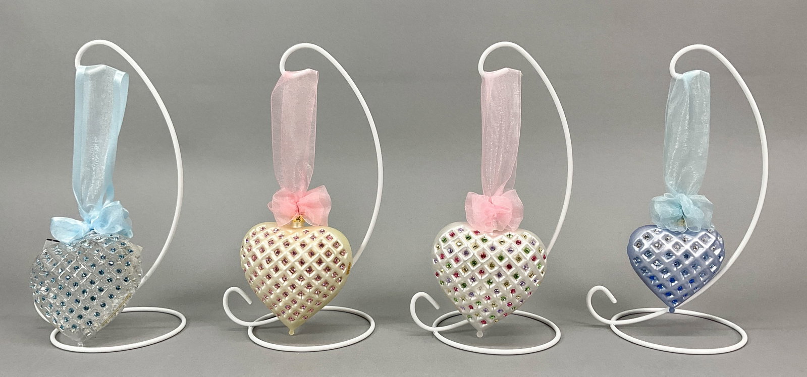 4 Swarovski Element Heart Ornaments: 4 Swarovski Element Heart Ornaments. Expressions from the heart - 1 blue - Party Hearty March and 2 pink - 785 Simply Sweet, 0398 Bunny Ears all 4" tall. Smaller blue heart - The Colors of Love 3". Or