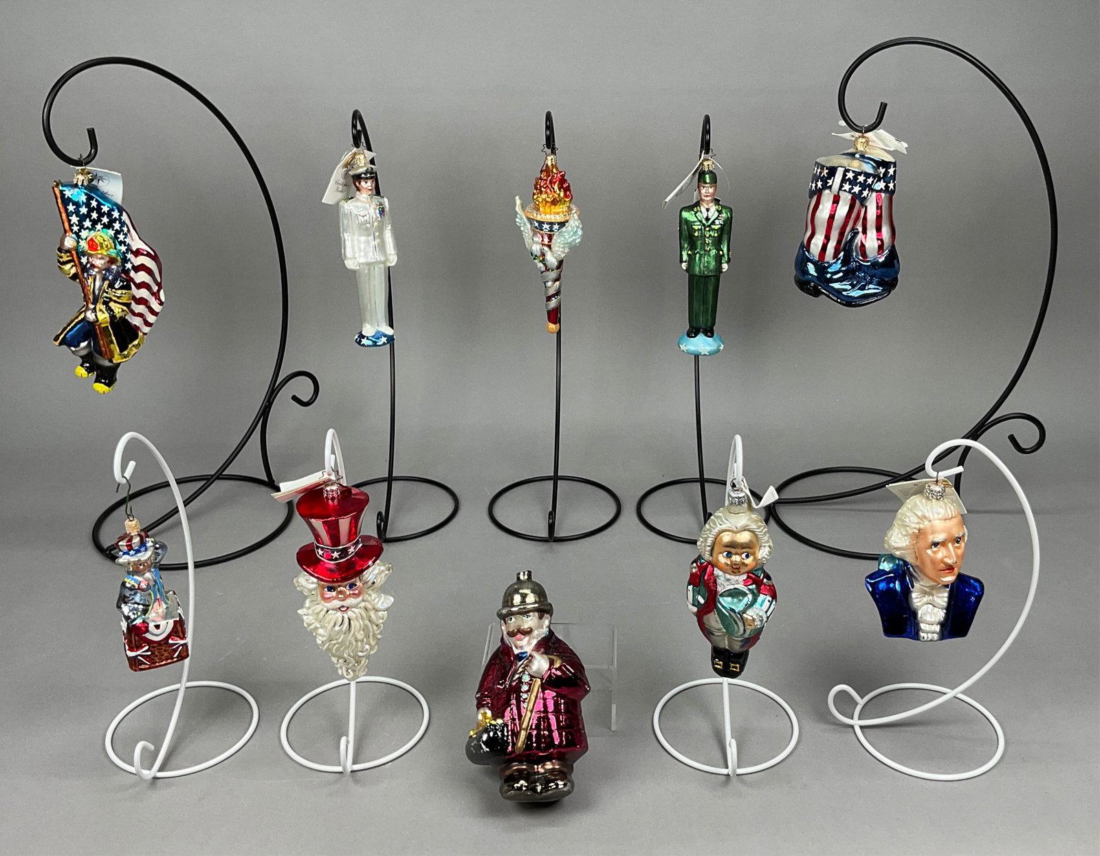 10 Radko Patriotic Ornaments Boots President: 10 Radko Patriotic Ornaments Most w/ Tags. Includes America's Bravest #01-0924-0 - 8" - tallest, Ready to Serve #1010101, Dress Whites #1010103, Santa Sam #1010398 - missing red paint on brim of hat, 