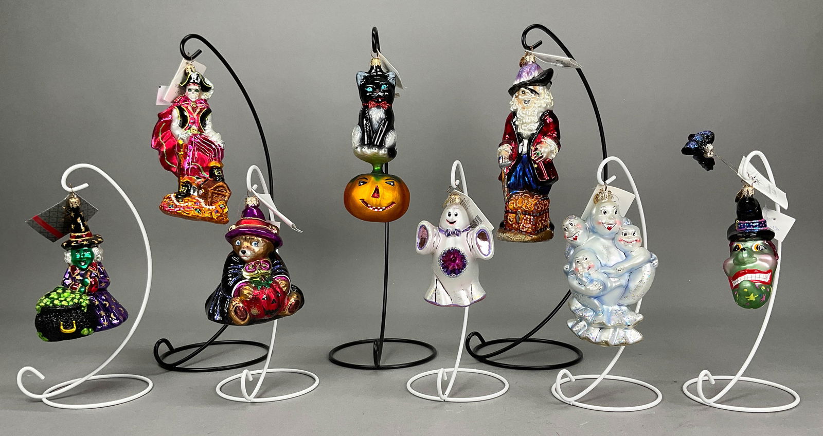 8 Radko Halloween Ornaments Ghost, Witch Bat: 8 Radko Halloween Ornaments with Tags. Includes Kitty Patch #98-026-0, Hell of a Guy #1010207, Boo Babes #01-0148-0, Hocus Pocus #105722, Bearwitched #990610, Won't Bat an Eye #02-0159-0, Skull Dugger