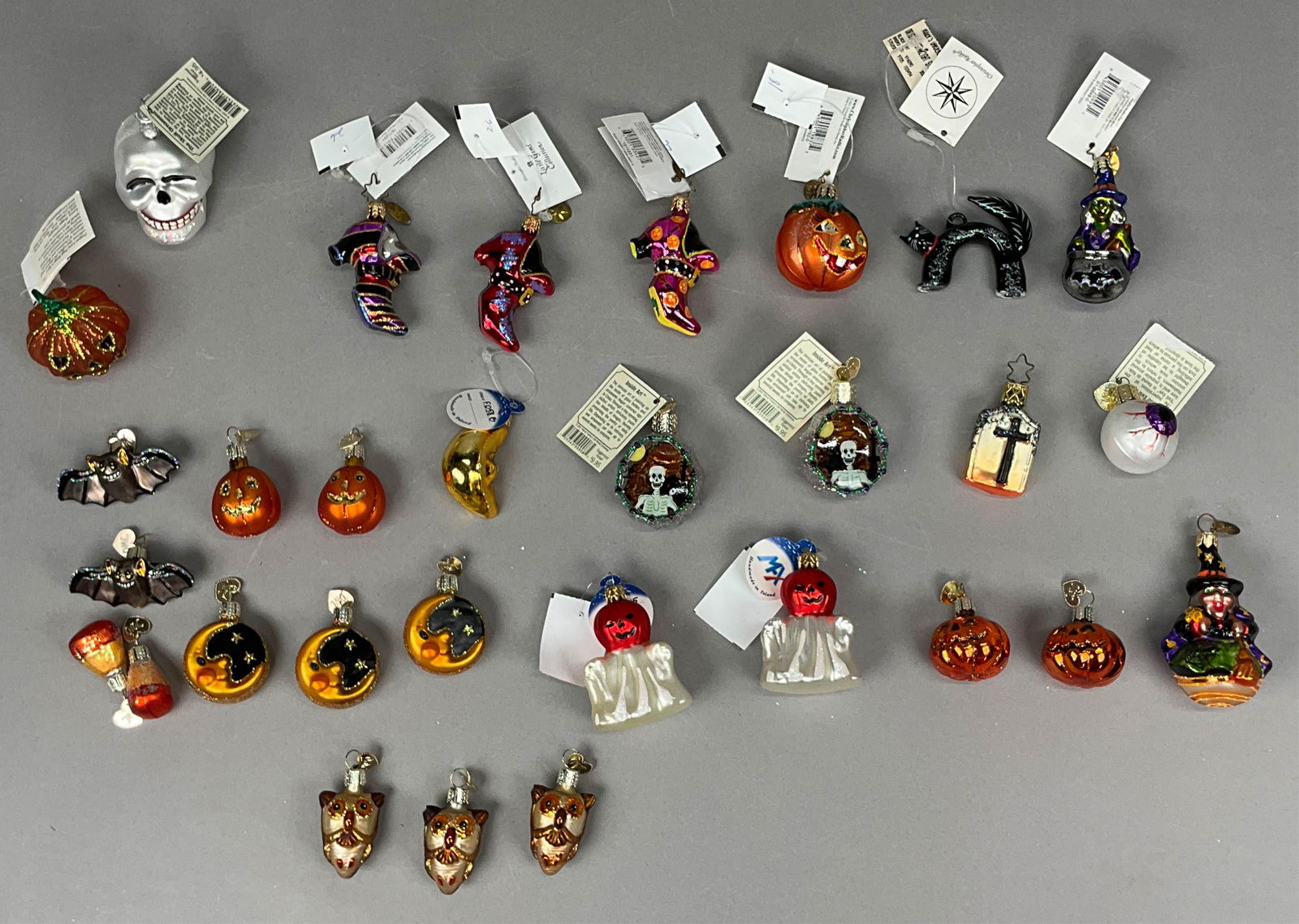 31 Halloween Ornaments Most w/o Tags Radko ghosts: 31 Halloween Ornaments Most w/o Tags Radko, Fraga, Old World Christmas, Mx. Including Old World Christmas The Evil Eye, Inside Art (x2), & The Skull Ornament, Moon (x3) - no tag, Owls (x3) - no tags,