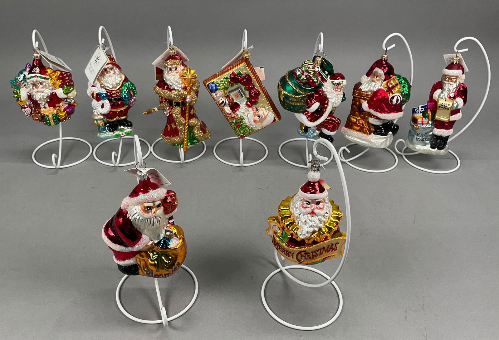 9 Radko Santa Christmas Ornaments Red Hot Santa: 9 Radko Santa Christmas Ornaments Most with Tags. Includes FAO Schwarz 1920 Santa - First in the Series - Limited Edition - #1491/3600, Mister Merry Message, Shimmy Down, Red Hot Santa #00-052-0 70281