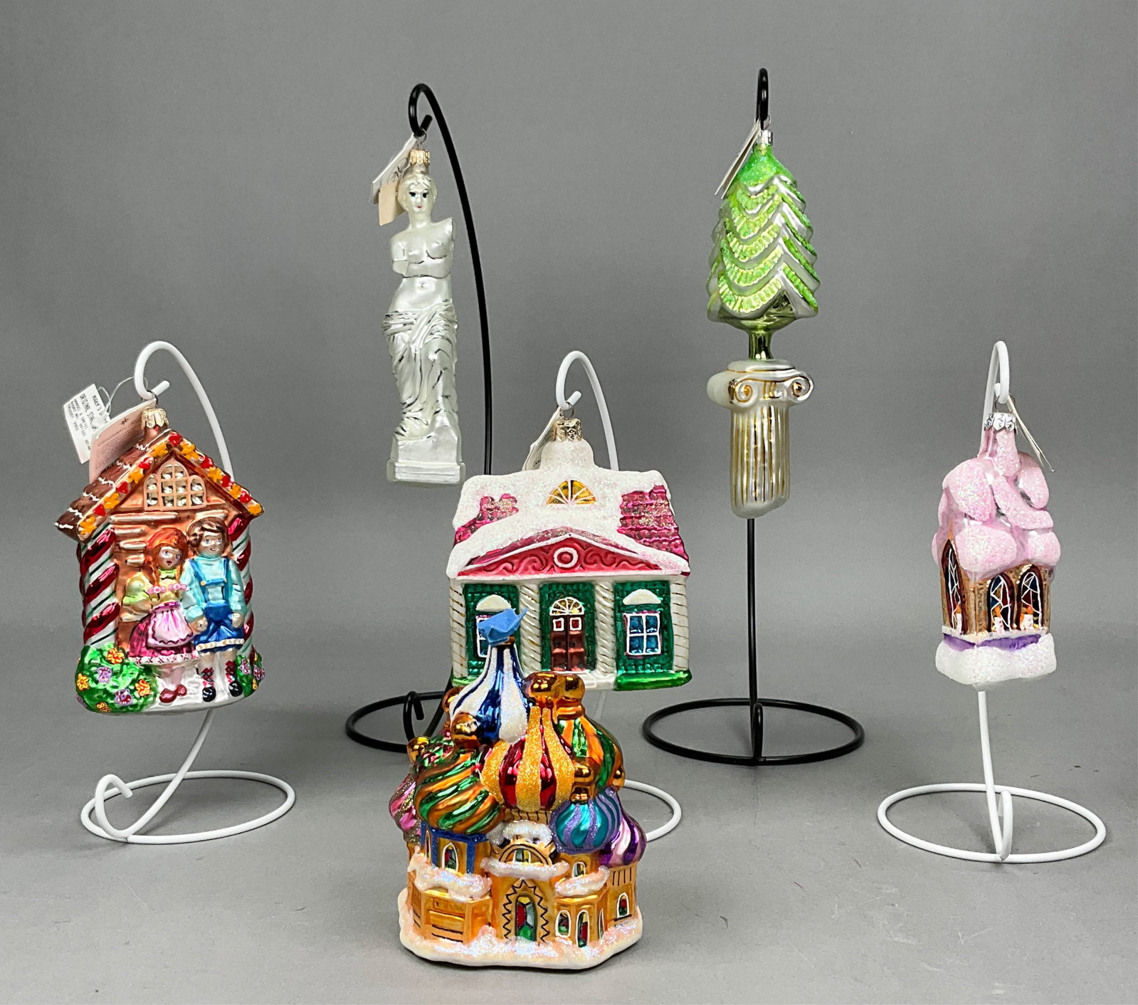 6 Radko Christmas Ornaments Most with Tags: 6 Radko Christmas Ornaments Most with Tags. Includes Hansel and Gretel #99-132-0, Classic Christmas Tree and Column, Sugar Hill #1178/10,000, St. Petersburg Ornament - Missing Topper for Hook, De Milo