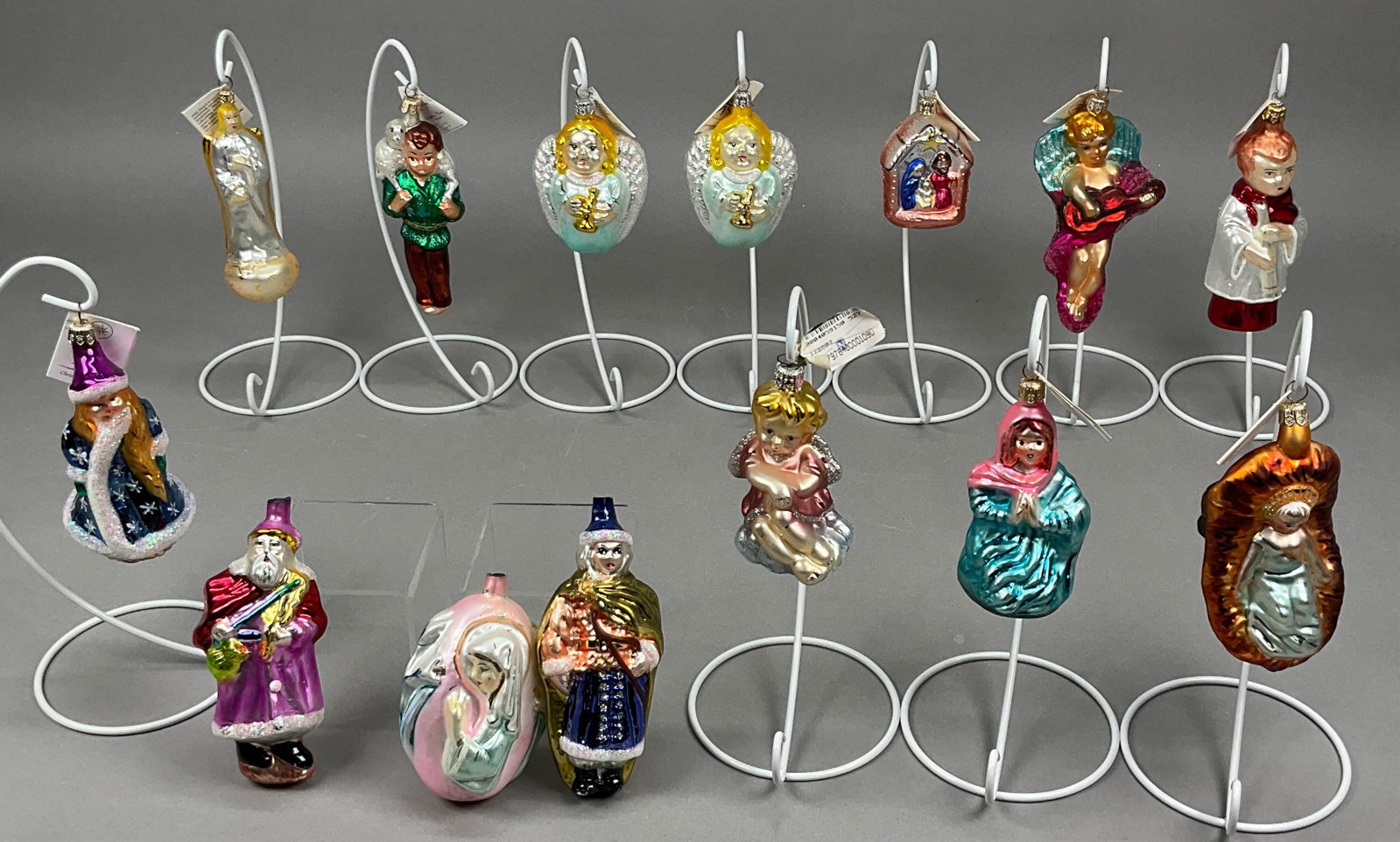 14 Radko Christmas Ornaments Nativity Mary: 14 Radko Christmas Ornaments Most w/ Tags. Includes The Nativity Baby Jesus, The Nativity Mary, Angels (x2), Choir Altar Boy, The Nativity, Gold Moon Dust, The Nativity Shepherd's Prayer Gloria, Russi