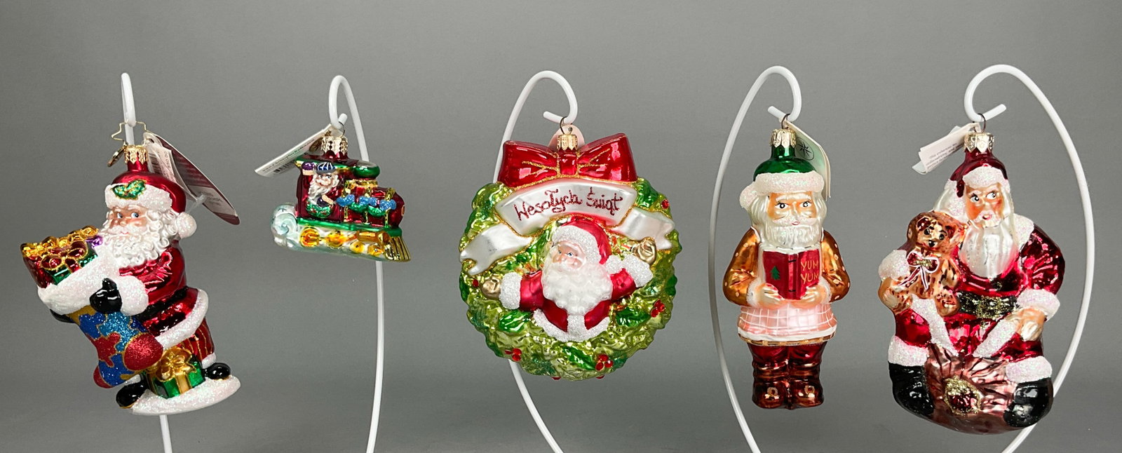 5 Christmas Ornaments with Tags Radko Glass Santa: 5 Radko Santa Christmas Ornaments with Tags. Includes Holding on for Hope #1017461, Cookbook Santa, Department Store Santa -- 6" - Longest, North Pole Junction Gem #01-0777-0 -- 2.75" - Shortest & Gla