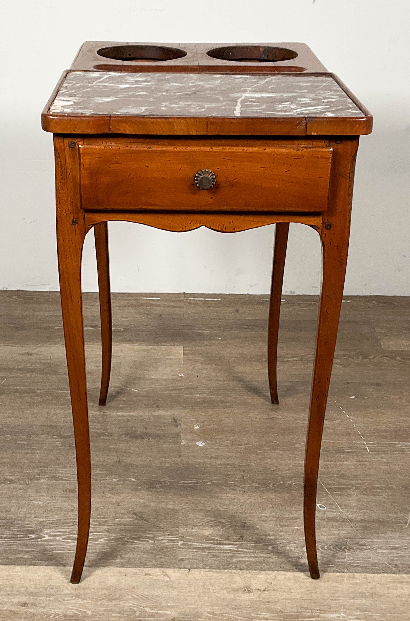 French Rafraichissoir Wine Cooler Table: French Provincial rafraichissoir dry bar table. Marble top, two wells (missing inserts), one drawer. 16 1/8"W x 23"D x 28 1/2"H. Chips and roughness along edges of marble top, minor scratches througho