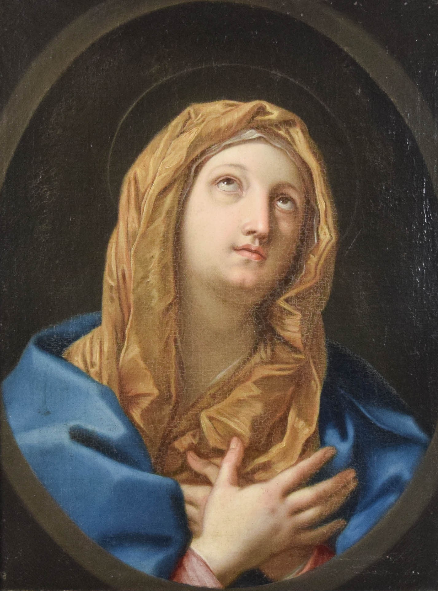 After Guido Reni Oil on Canvas Virgin at Prayer: After Guido Reni (Italian, 1575-1642). Oil on canvas, Virgin at Prayer, after Reni. Unsigned. 24 1/2" x 18 3/4" (with frame 31 1/2" x 26"). Crazing throughout, varnished, some inpainting.