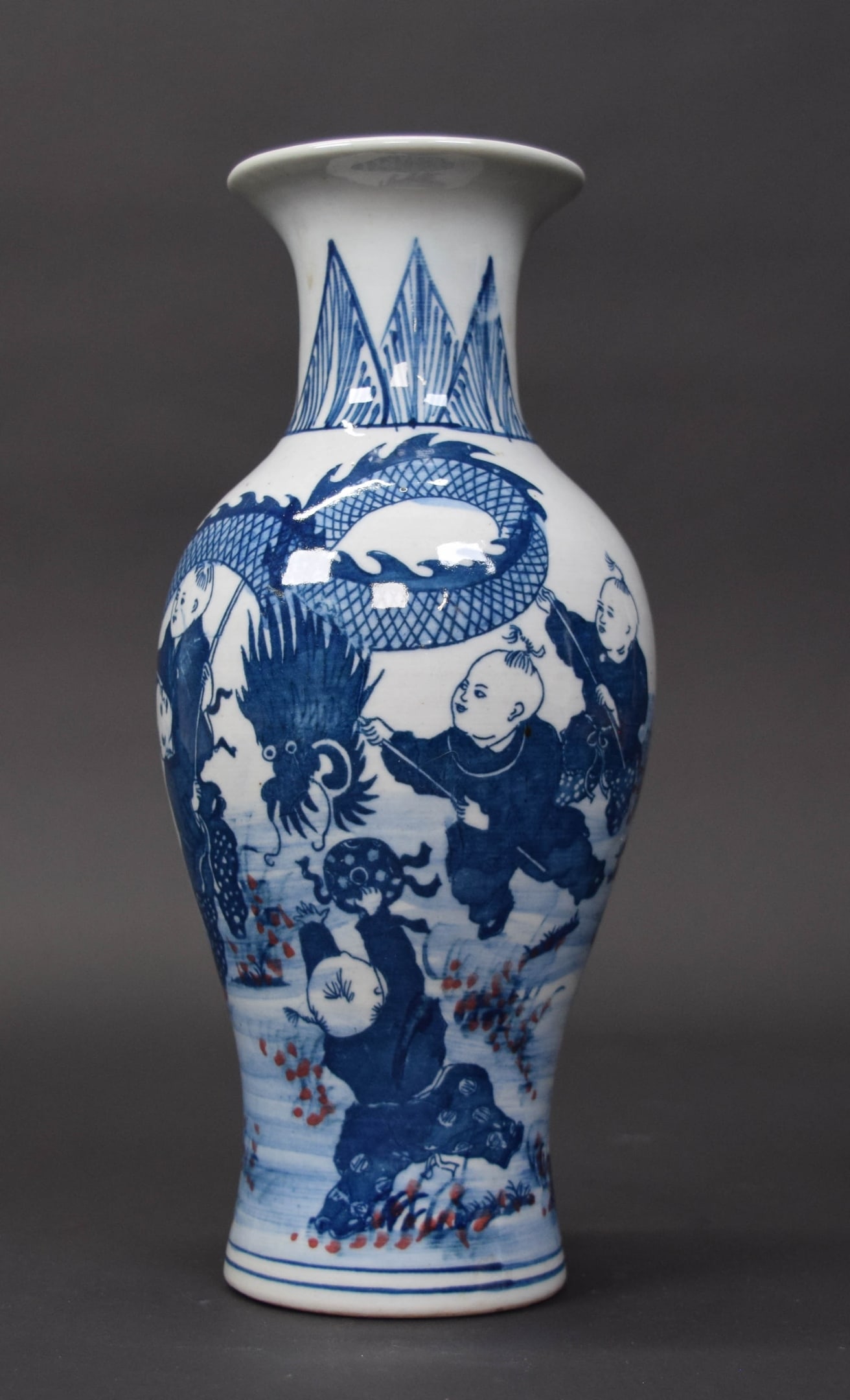 Chinese Porcelain Blue & White Vase Qianlong Marks: Chinese porcelain vase. Blue and white, with motif of children with dragon. Blue Qianlong style mark to the underside. 10 1/8"H. Minor scratches.