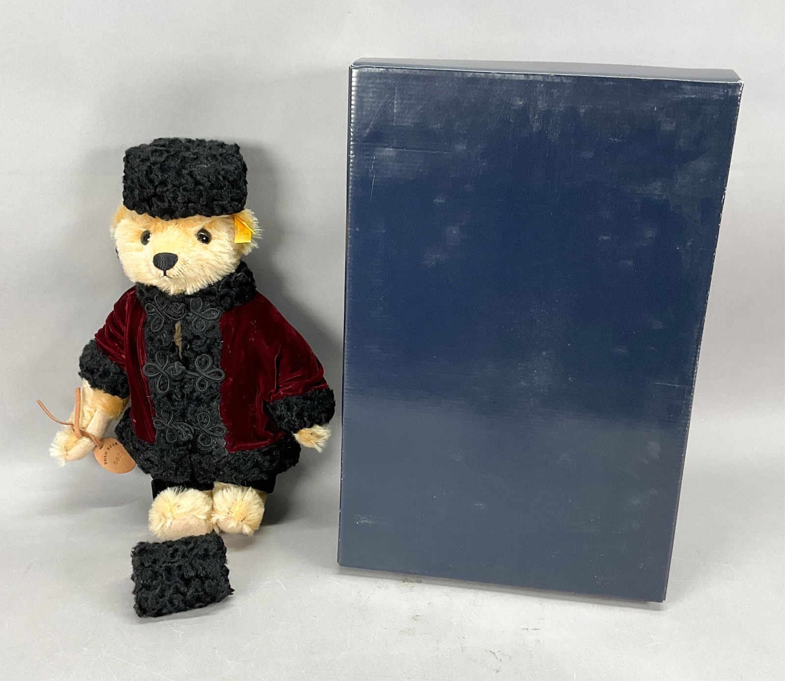 Steiff Ralph Lauren Russia Bear: Vintage Steiff Ralph Lauren Polo stuffed teddy bear, Russia Bear, 650581. With ear button, ear tag, Ralph Lauren paper tag, leather tag numbered 662 and original box. Bear 12 1/2"H not including hat.