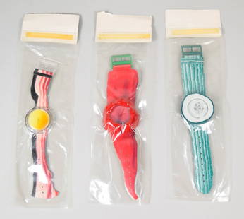 3 Alfred Hofkunst Swatch POP Watches: Alfred Hofkunst for Swatch. Set of 3 POP Vegetable watches. PZ100 Gu(H)rke cucumber, PZ101 Bonju(H)r bacon and egg, PZ102 Verdu(H)ra. All with partial original packaging.