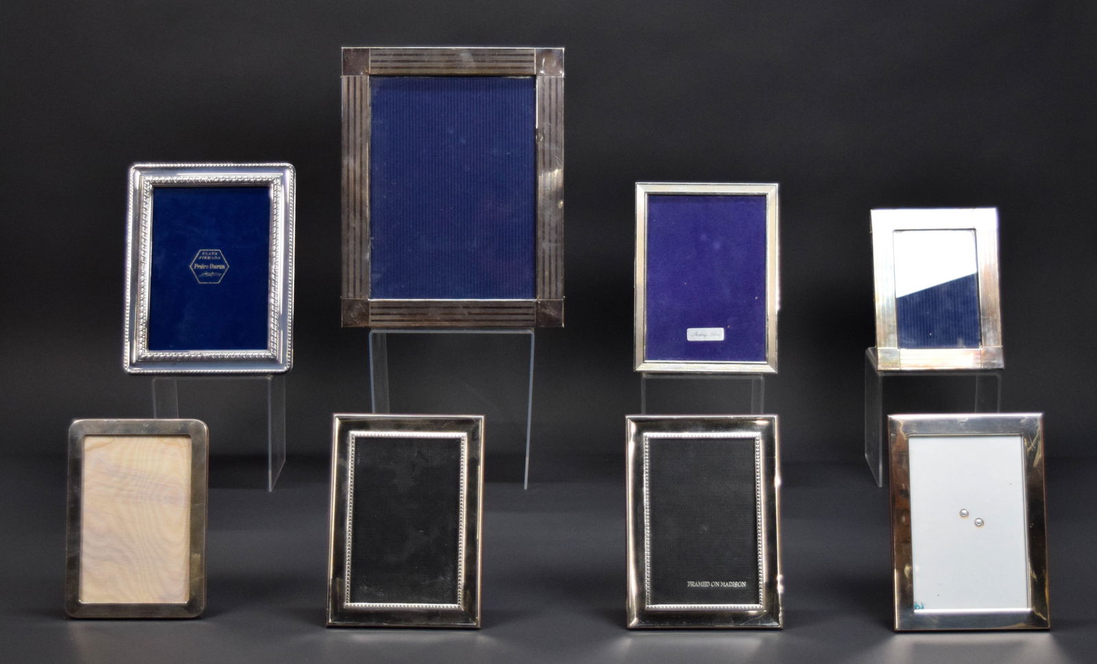 8 Sterling Silver Frames Cunill, Pampaloni, Duran: Lot of 8 sterling silver picture frames. 3 Cunill including a pair, pair also marked Framed on Madison, openings 5 5/8" x 3 5/8" and 5 3/4" x 3 3/4"; Bergdorf Goodman with Italian hallmarks, opening 5