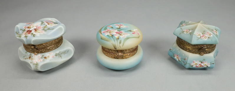 3 C.F. Monroe Nakara Dresser / Trinket Boxes: 3 C.F. Monroe Nakara hinged lidded dresser / trinket box. Floral decoration, gilt metal mounts. All marked Nakara C.F.M. Co. on the underside. Square box 3 1/2"W x 3 1/2"H.