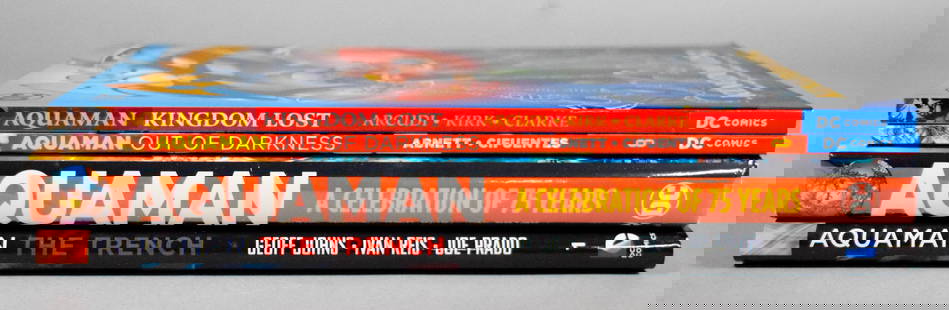 4 DC Comics Aquaman Books: 4 DC Comics Aquaman books. Kingdom Lost, Volume 8 Out of Darkness, A Celebration of 75 Years, Volume 1 The Trench. 75 Years sealed in plastic, others all in read condition.