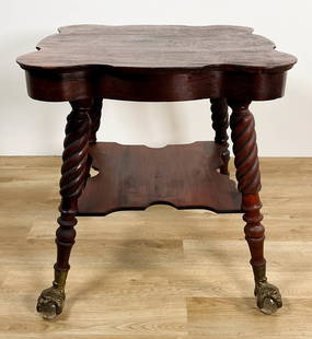 Victorian Side Table With Glass Ball And Claw Feet: Victorian side table with glass ball and claw feet. Claw feet decorated with faces and balls are glass. Barley twist legs. Refinished with some scratches to top and rubs to legs. 30" Tall x 27 3/4"