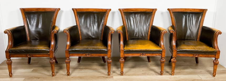 Four English Leather Library Chairs: Four English library or club chairs. Rubbing, nicks and loss throughout. Especially prevalent on the front of the arms. Seats and back with staining and marks. 35 1/4" Tall x 28 1/2" Wide x 29" Deep x