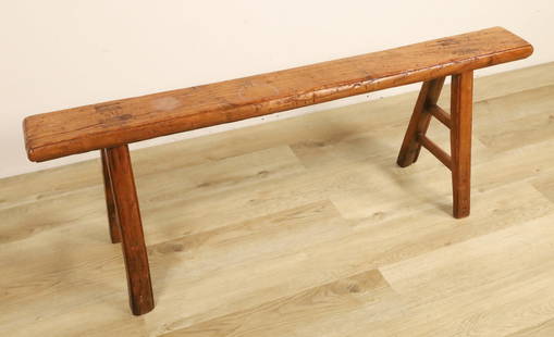 Primitive Wood Farmhouse Bench: Primitive wood farmhouse bench. Through tenon construction. Scrapes, nicks and gouges throughout. Water stain ring on top. 18 1/2" Tall x 51" Long x 12" Deep