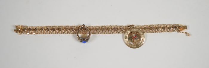 14 Karat Gold Charm Bracelet With Sterling Ring