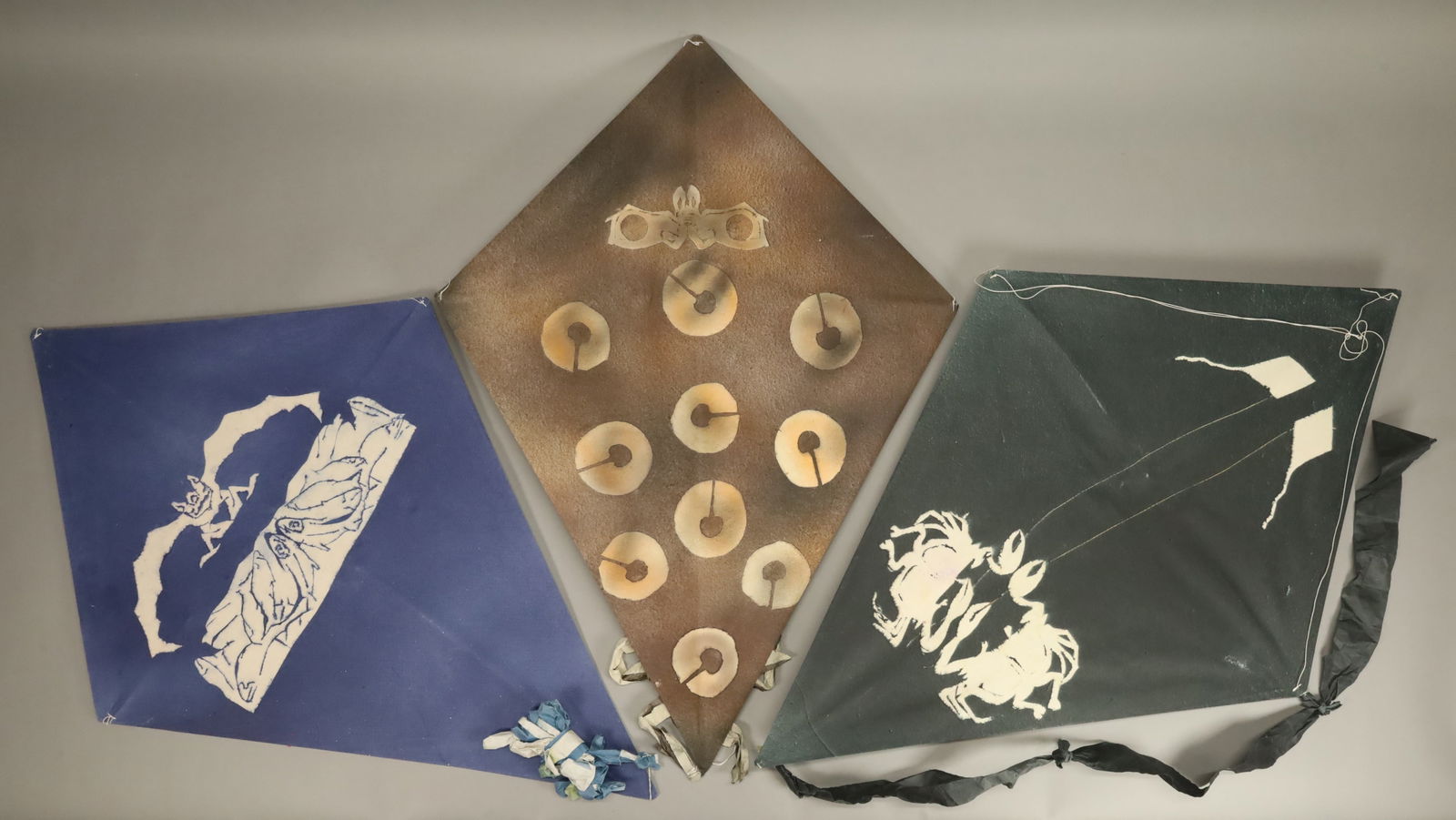 3 Francisco Toledo Stencil Printed Kites: Francisco Toledo (Mexican, 1940-2019). 3 stencil printed paper kites. Unsigned, all with Arte Papel Oaxaca labels on verso. Brown 33 1/2" x 23 1/2"; blue 35 5/8" x 24", and gray 35 1/2" x 23 1/2" (los