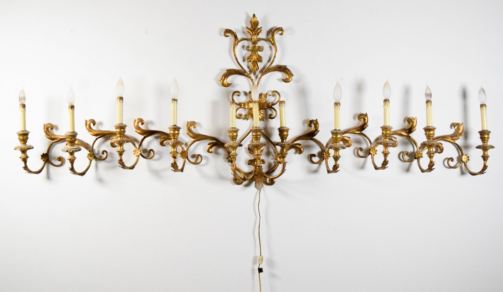 Giltwood & Metal 11 Light Wall Sconce: 11 light gilt wood and metal wall sconce. 74"L x 27 1/2"H.