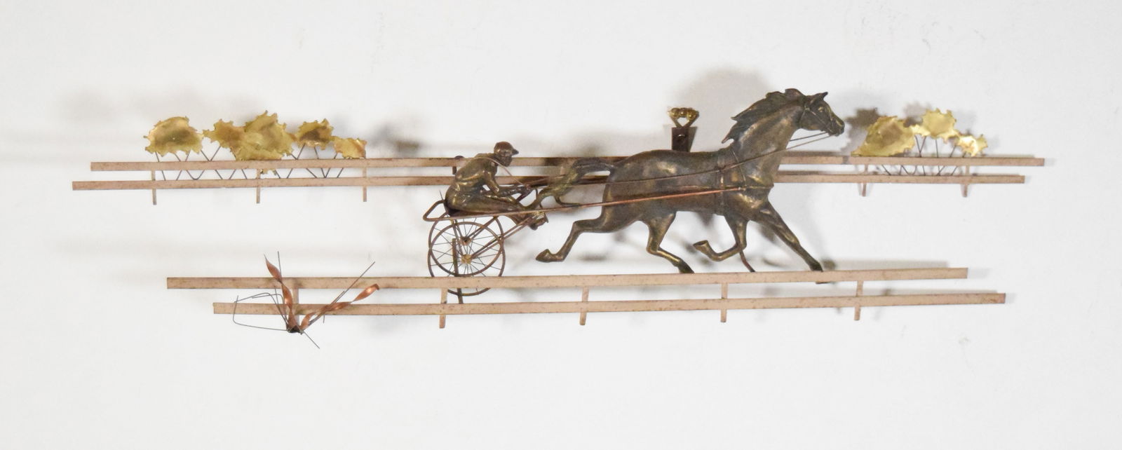 Curtis Jere Metal Wall Sculpture Sulki Racer: Curtis Jere metal wall sculpture harness racer in sulki. 13" Tall x 43" Long. Some rust and bending to metal. Signed lower right on fence.