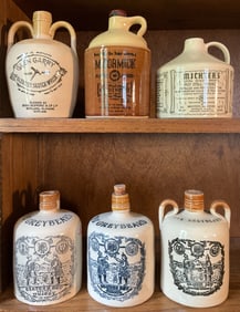 6 Vintage Stoneware Whiskey Bottles