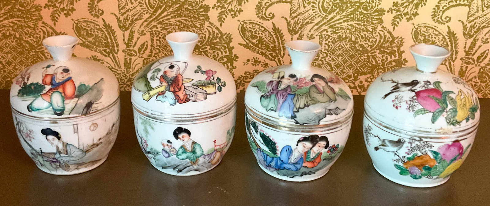 4 Famille Rose Chinese Porcelain Lidded Bowls: 4 Antique Famille Rose Chinese Porcelain Lidded Bowls. Each lidded bowl has a different design on both the bowl and the lid. Each measures 5" H x 4" D. Without the lid, they are 2.75" H. A few contain