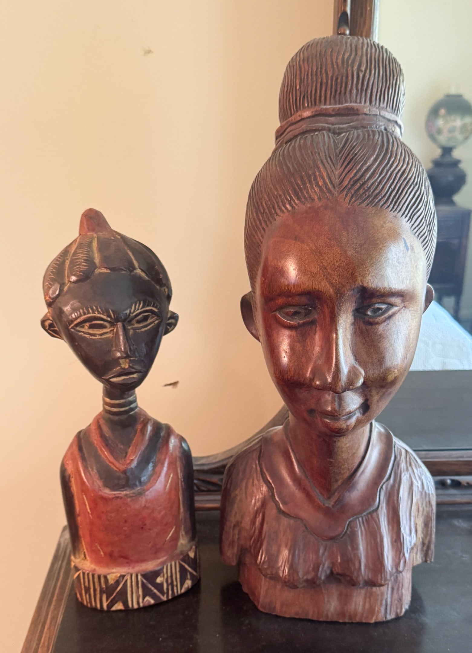 2 Carved Wood Busts Woodens: 2 Carved Wood Bust, Largest is 20" x 9" x 5" signed "Silvio Fancis" on bottom, smaller carved in Ghana 15" x 5" x 4"