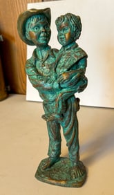 Bronze Statue Of Boy And Man