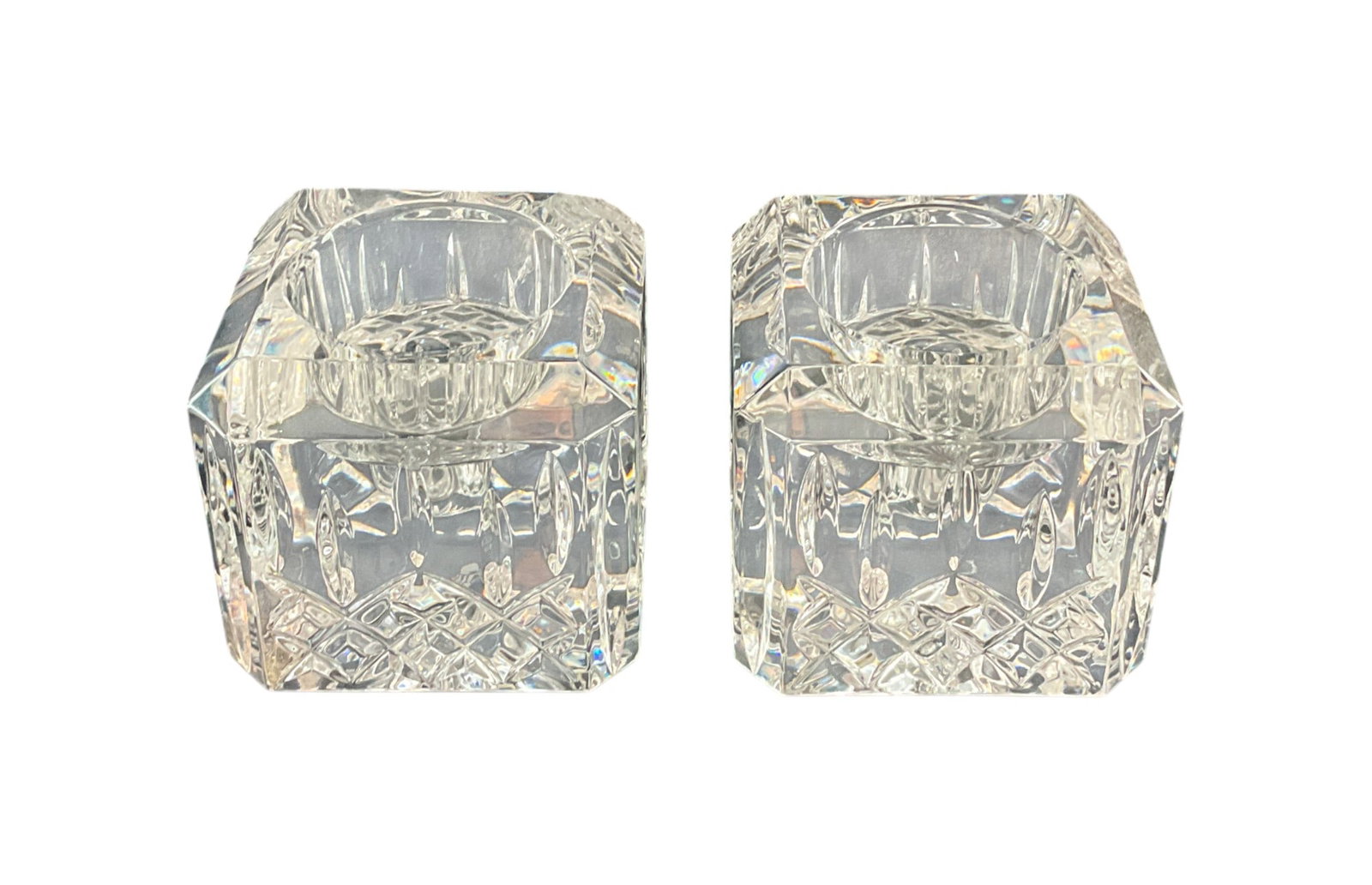 Pair of Waterford Crystal Votive Candle Holders: Pair of Waterford crystal square votive candle holders in Lismore pattern with Waterford mark on base. Damage to each, including chipped bottom corner of one and chipped top corner of other. 2 1/2" h