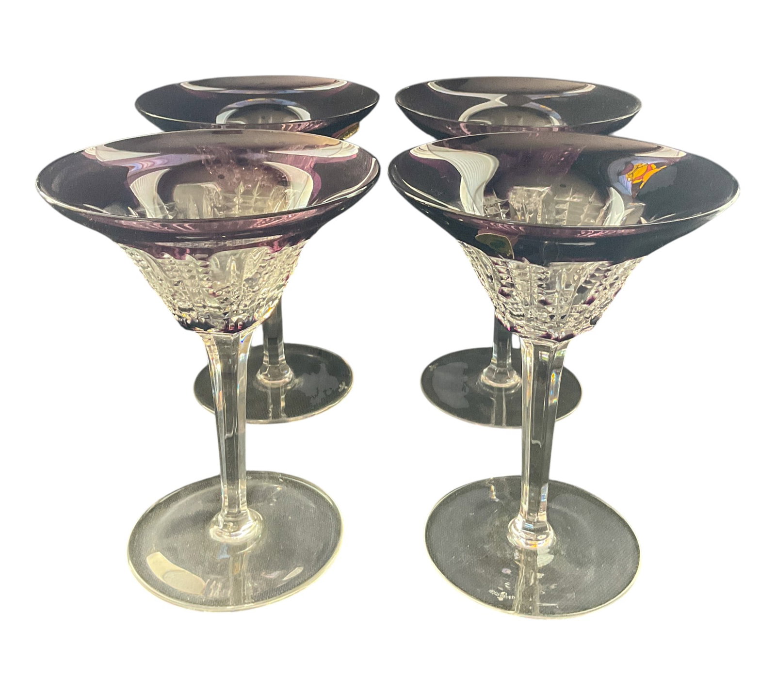 Waterford Simply Pastel Lilac Martini Glasses: Set of four Waterford crystal "Simply Pastel Lilac" martini glasses. No visible flaws. 7" h x 5" w x 4" diameter.