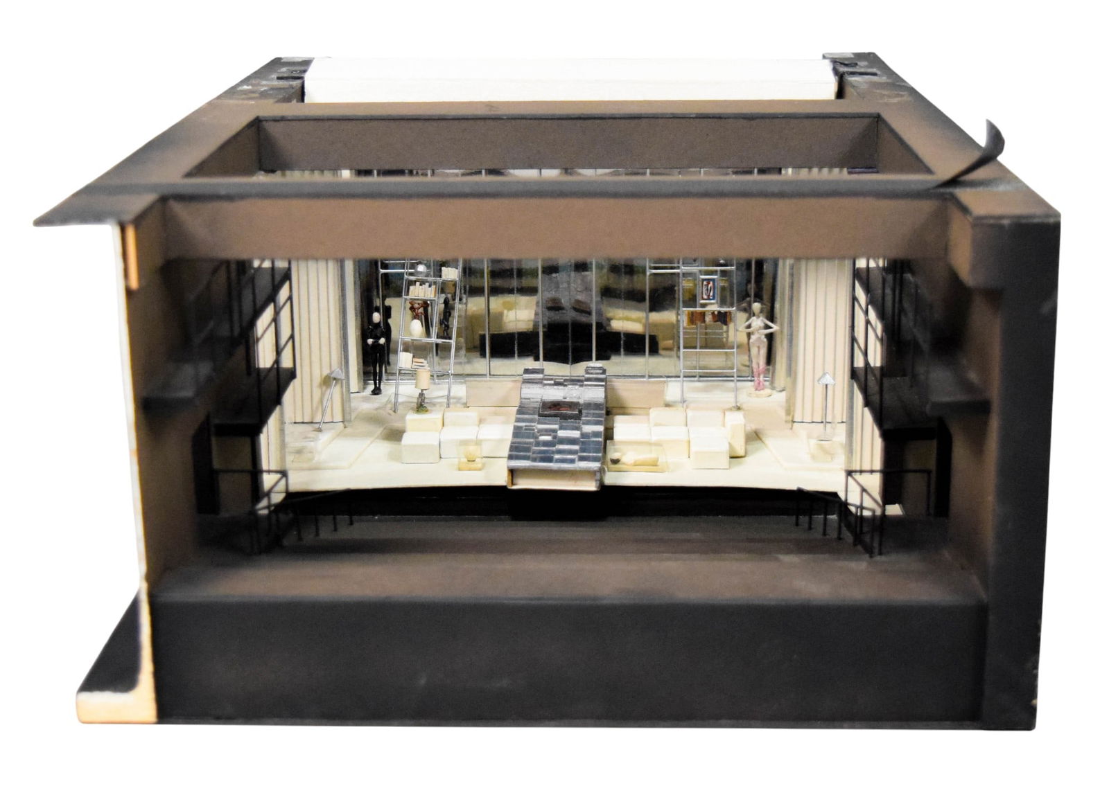 Drinks Before Dinner Set Model: Tony Walton (British, 1934-2022). Drinks Before Dinner. Set model, mixed media with cardboard, metal, acrylic and other materials. In a plexiglass case. 12"L x 17"D x 6 1/2"H. With a sketch of the set