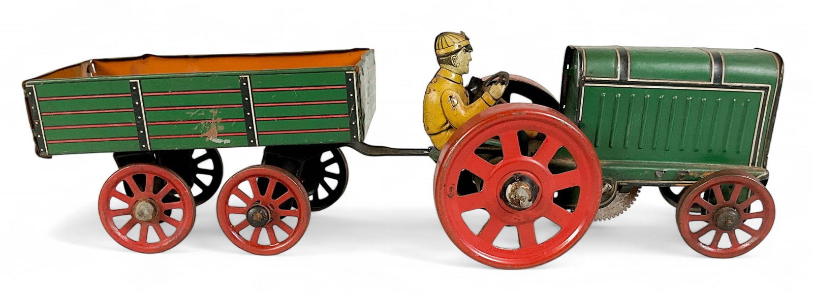 Gunthermann SG Fordson Tin Litho Tractor Toy: Gunthermann Fordson tin litho wind-up tractor and wagon. Marked SG Germany. 12"L. With rusting and paint loss throughout, panels on tractor dented and separating at corners, axles and wheels dented an