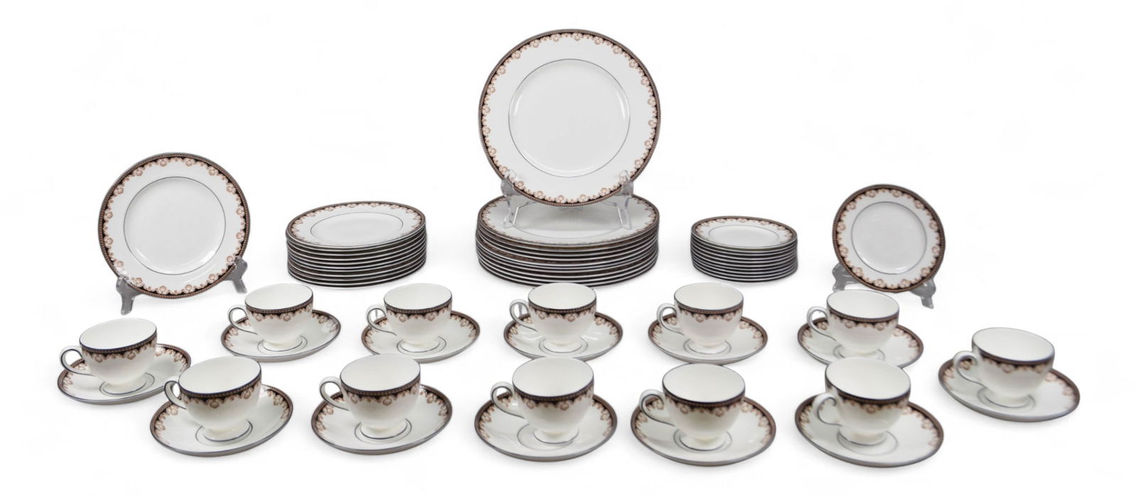 60 Pieces Wedgwood Medici Pattern Dinnerware: Wedgwood porcelain dinner set in the Medici pattern. Service for 12, 60 pieces including 12 dinner plates, 12 salad plates, 12 bread & butter plates, 12 cups and 12 saucers. Dinner plates 10 3/4"-diam