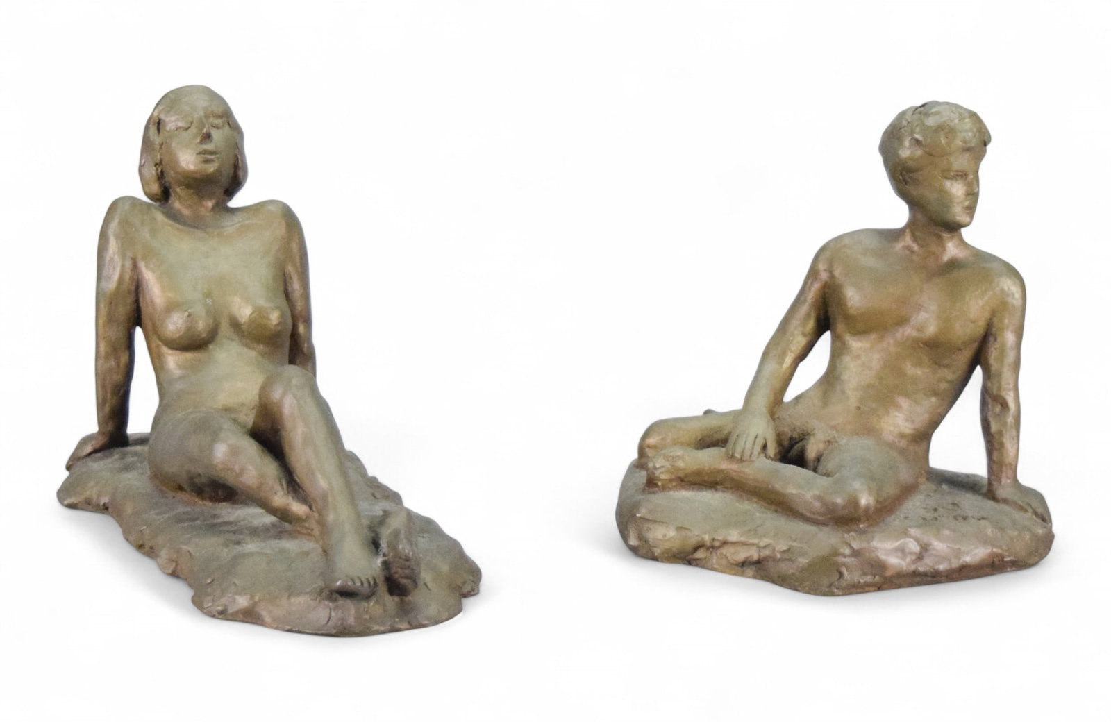 2 Bronze Nudes Signed S.Q.: 2 bronze sculptures, nudes. Each signed S.Q. and dated 11'00 and 12'00. Male nude 8 1/4"H x 8 1/4"W; female nude 8"H x 11 5/8"L.