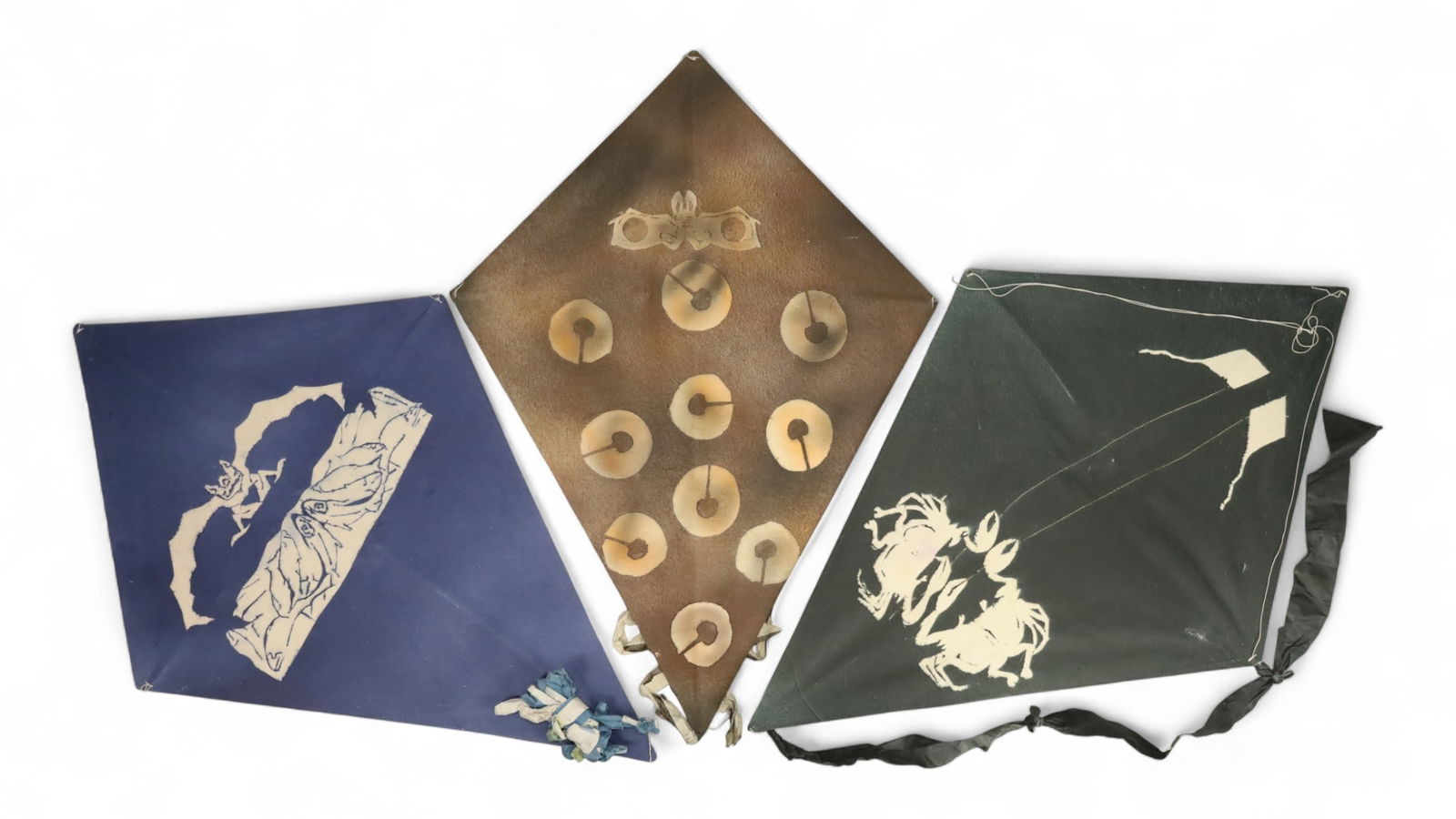 3 Francisco Toledo Stencil Printed Kites: Francisco Toledo (Mexican, 1940-2019). 3 stencil printed paper kites. Unsigned, all with Arte Papel Oaxaca labels on verso. Brown 33 1/2" x 23 1/2"; blue 35 5/8" x 24", and gray 35 1/2" x 23 1/2". Los