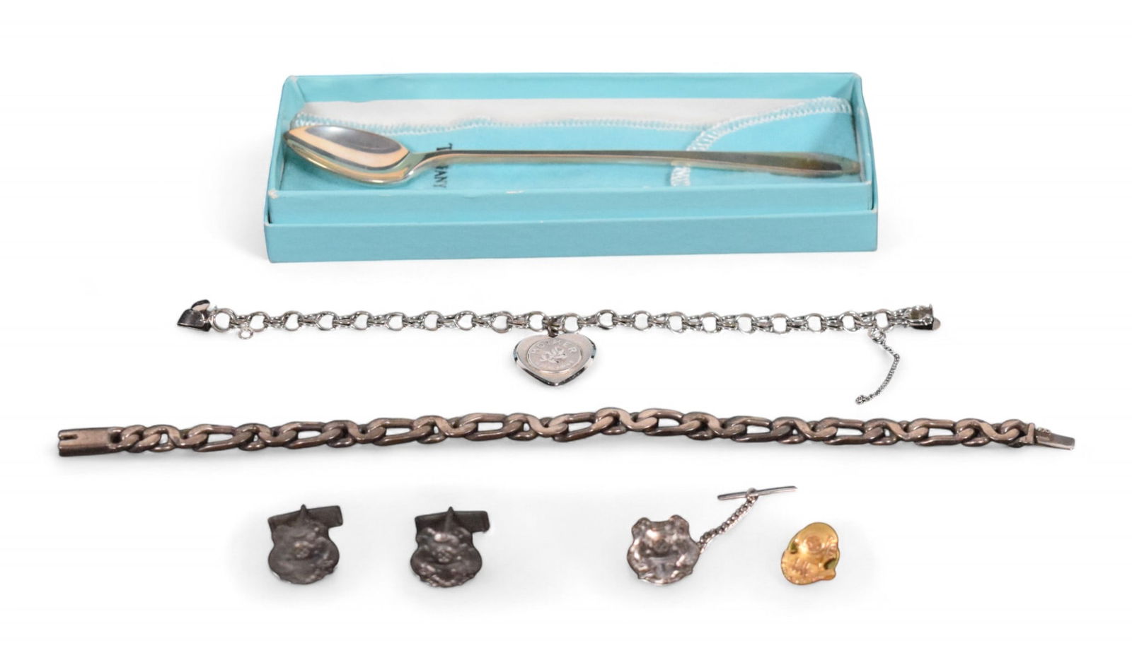 Lot of Sterling & 10k Gold Jewelry: Lot of sterling silver and 10k gold jewelry. Taxco Mexican sterling bracelet, charm bracelet (charm not sterling), pair of cufflinks with matching tie pin, 10k gold diver's helmet organizational pin;