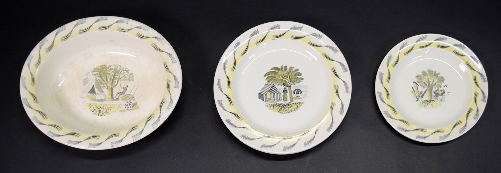6 Pieces Eric Ravilious Wedgwood Garden Porcelain: 6 pieces English porcelain, designed by Eric Ravilious for Wedgwood in the Garden pattern. 4 luncheon plates, 1 salad plate, 1 oval serving dish. Luncheon plates each 8 1/4"-diameter. All with crazing