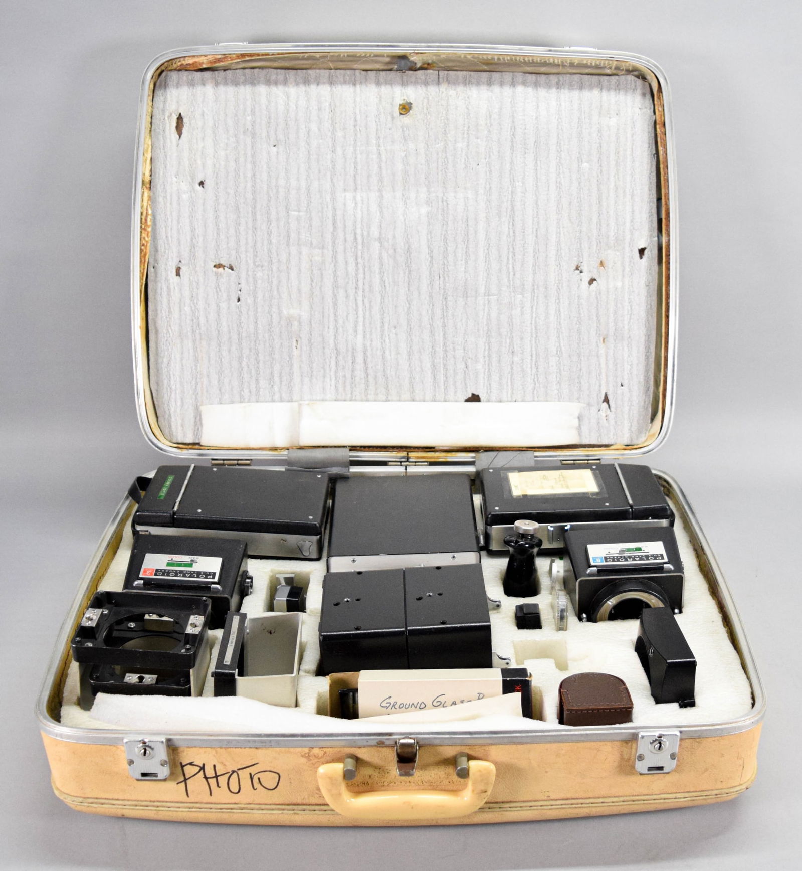 Polaroid CU-5 Land Camera Kit: Polaroid CU-5 Close-Up Land Camera kit, with 2 camera bodies, 5" and 3" lenses, 2 ratio multipliers, CU-5 AC power pack, and other accessories. In a suitcase with fitted interior. Camera bodies each