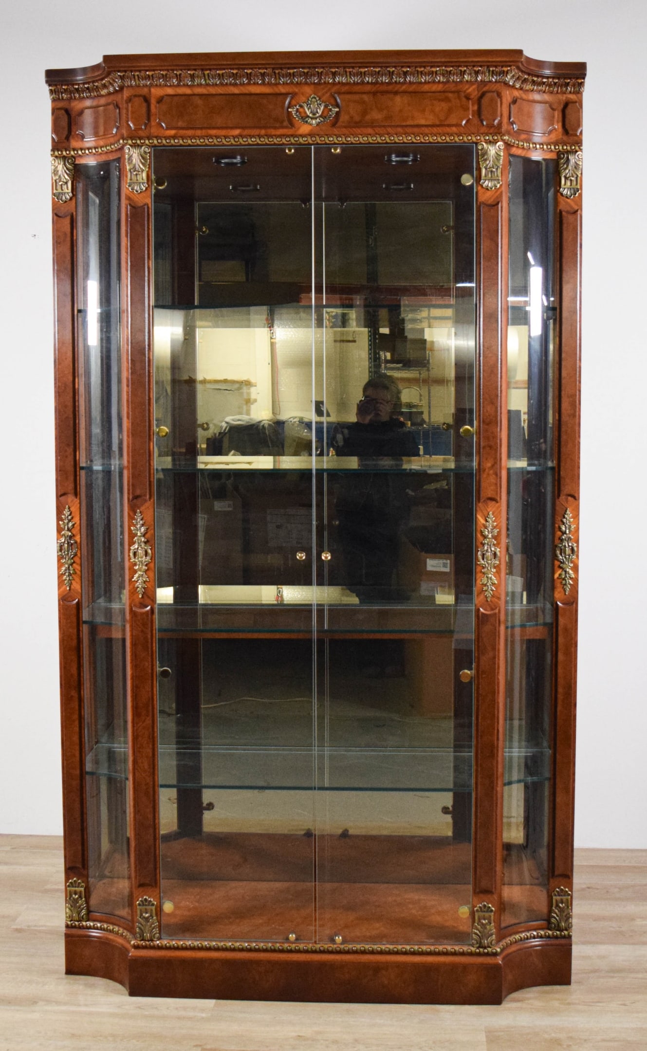 Henredon Grand Provenance Display Cabinet: Henredon "Grand Provenance" lighted display cabinet. 2 glass doors, 4 interior glass shelves. Paper Henredon labels on the rear panel. 84"H x 48"W x 17"D. Lighting working. Split and minor chips