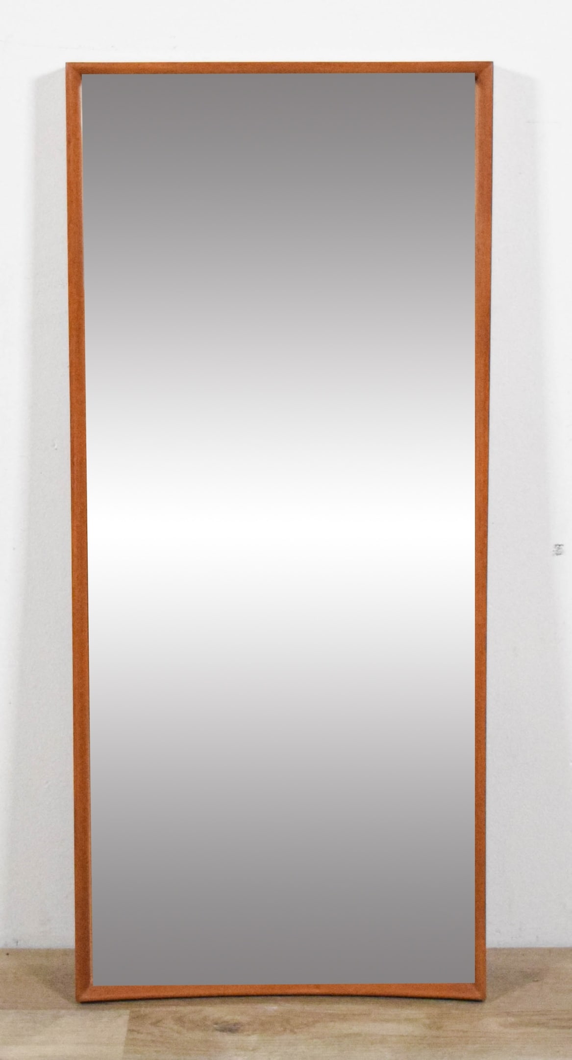 Danish Modern Mirror: Danish modern mirror. Marked Made in Denmark on the reverse. 37 3/4" x 16 3/4".