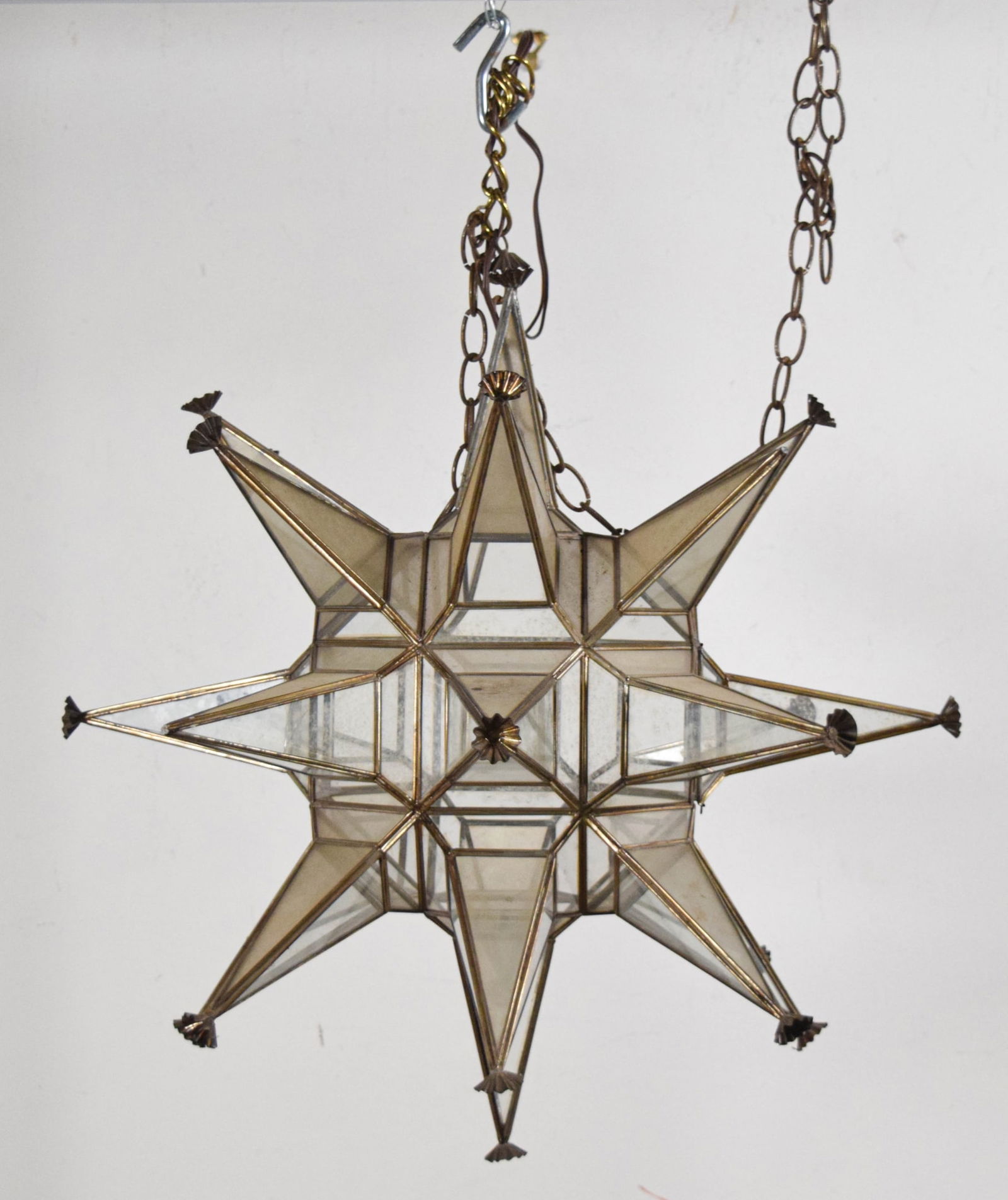 Moravian Star Hanging Pendant Light: Moravian star hanging pendant light. Glass panels, unsigned. 24"H x 24"W. One panel cracked, 4 end points detached (3 present); no socket. Panel with door detached at hinge.