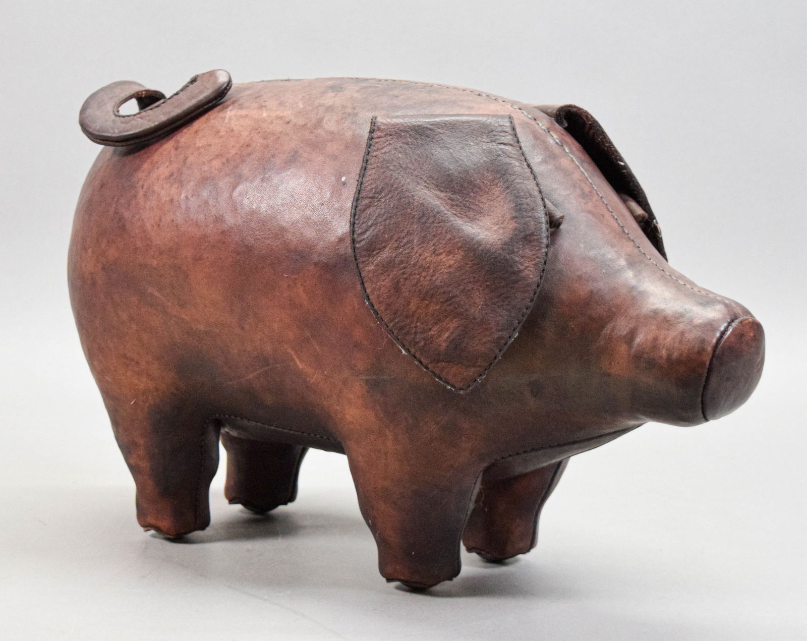 Abercrombie & Fitch Style Leather Pig: Leather pig, in the style of Abercrombie & Fitch. Unmarked. 10 1/4"H x 16 1/4"L.